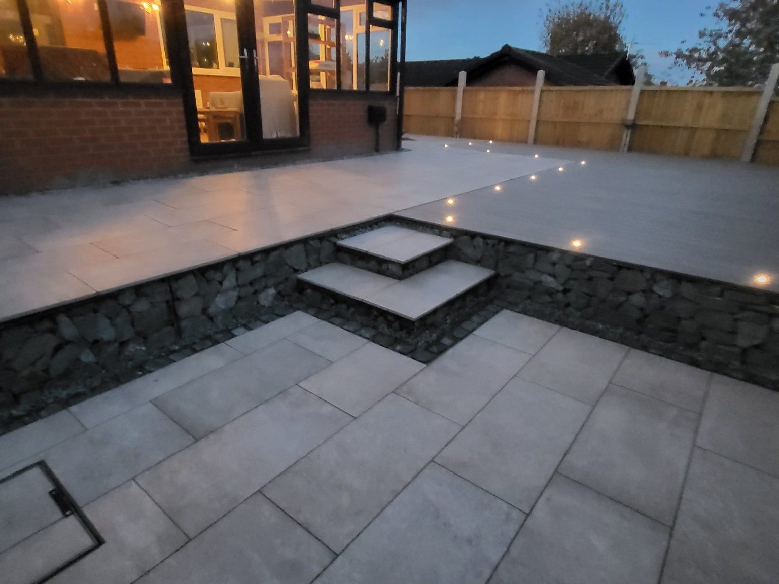 Completed porcelain patio landscaping